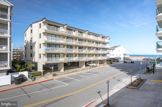 8 35th St Unit 401, Ocean City, MD 21842 - view of apartment building / complex featuring uncovered parking
