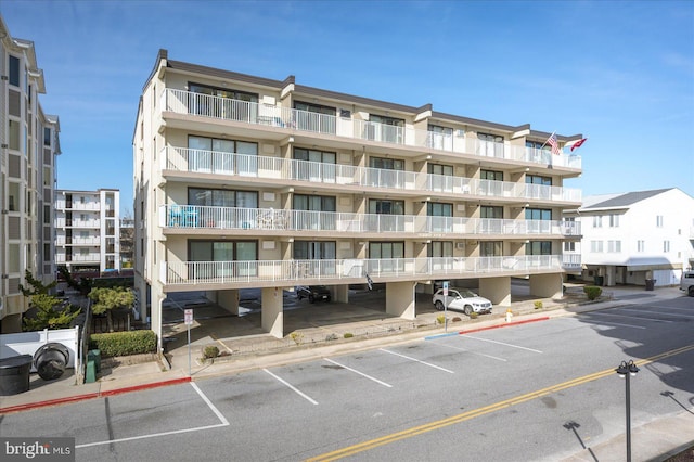 8 35th St Unit 401, Ocean City, MD 21842 - view of apartment building / complex with uncovered parking