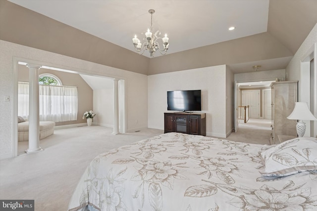 bedroom featuring carpet, vaulted ceiling, decorative columns, and a chandelier