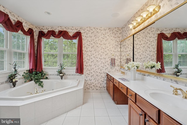 bathroom with a jetted tub, wallpapered walls, tile patterned floors, and double vanity