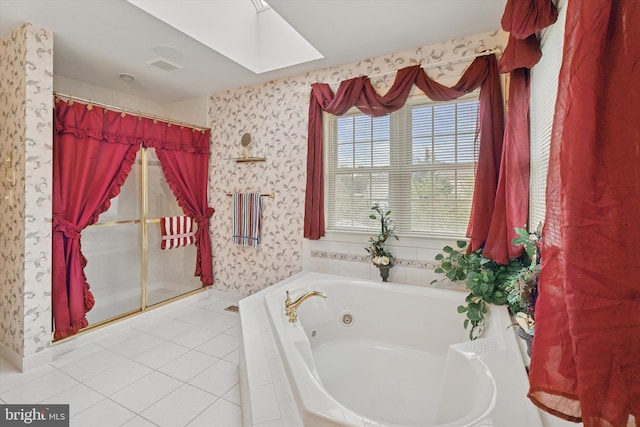 full bath featuring wallpapered walls, a stall shower, a skylight, a whirlpool tub, and tile patterned flooring