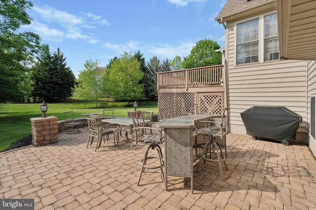 view of patio / terrace featuring outdoor dining space and area for grilling