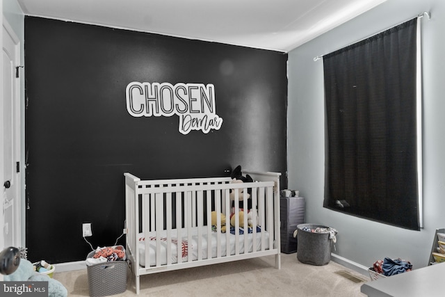 39 Baltic Ct, Inwood, WV 25428 - carpeted bedroom featuring a crib and baseboards