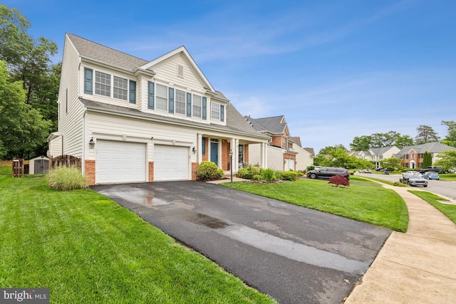 10611 Tattersall Dr, Manassas, VA 20112 - traditional-style house with brick siding, driveway, an attached garage, and a front yard