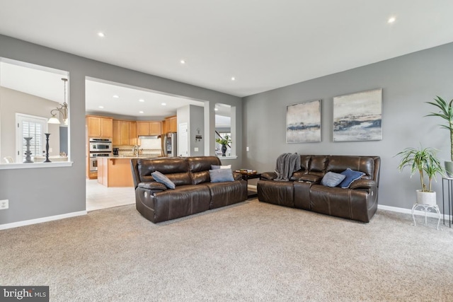 10611 Tattersall Dr, Manassas, VA 20112 - living area with light colored carpet, recessed lighting, and baseboards