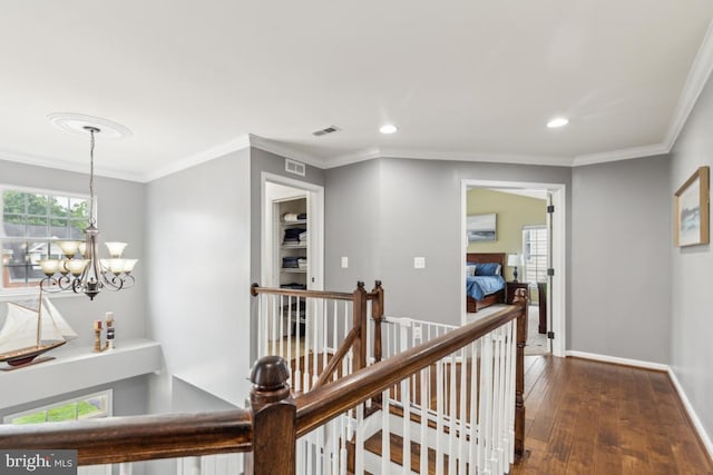 10611 Tattersall Dr, Manassas, VA 20112 - corridor with an upstairs landing, dark wood-type flooring, a chandelier, recessed lighting, and baseboards