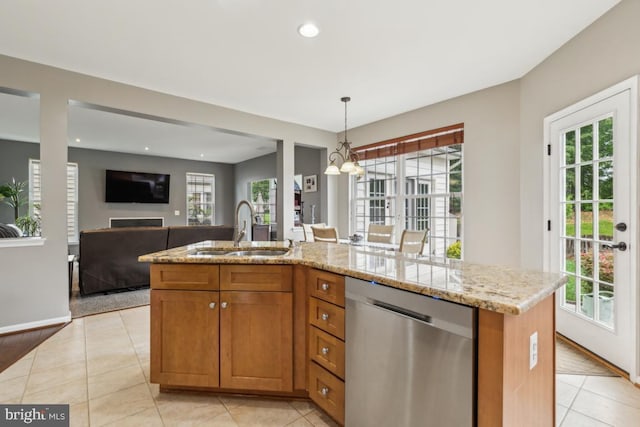 10611 Tattersall Dr, Manassas, VA 20112 - kitchen with dishwasher, a sink, light tile patterned flooring, a chandelier, and plenty of natural light