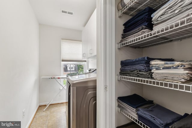 10611 Tattersall Dr, Manassas, VA 20112 - washroom featuring washing machine and dryer and baseboards