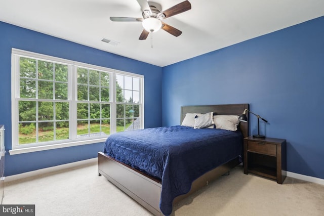 10611 Tattersall Dr, Manassas, VA 20112 - carpeted bedroom with baseboards and ceiling fan