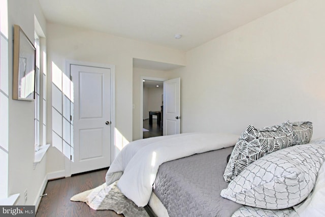 23109 Cottonwillow Sq, Brambleton, VA 20148 - bedroom with wood finished floors and baseboards