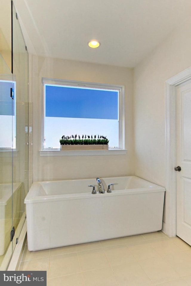23109 Cottonwillow Sq, Brambleton, VA 20148 - bathroom with tile patterned floors, healthy amount of natural light, a stall shower, and recessed lighting