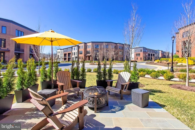 23109 Cottonwillow Sq, Brambleton, VA 20148 - view of patio / terrace with a fire pit