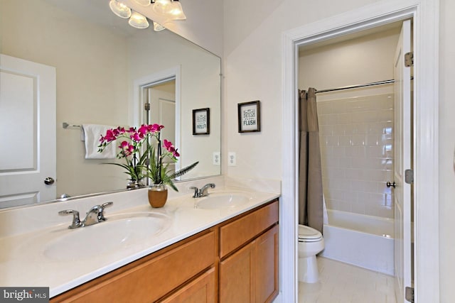 23109 Cottonwillow Sq, Brambleton, VA 20148 - bathroom with toilet, double vanity, tile patterned flooring, and shower / tub combo with curtain
