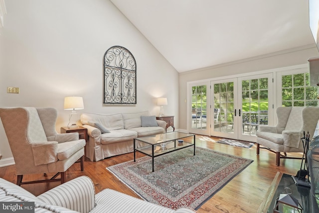 36 Wingstone Ln, Devon, PA 19333 - living area with french doors, high vaulted ceiling, wood finished floors, and baseboards