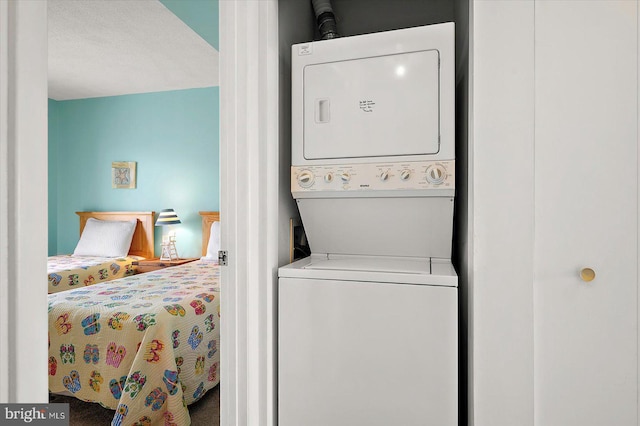 614 Osprey Rd Unit D, Ocean City, MD 21842 - washroom featuring stacked washer / dryer