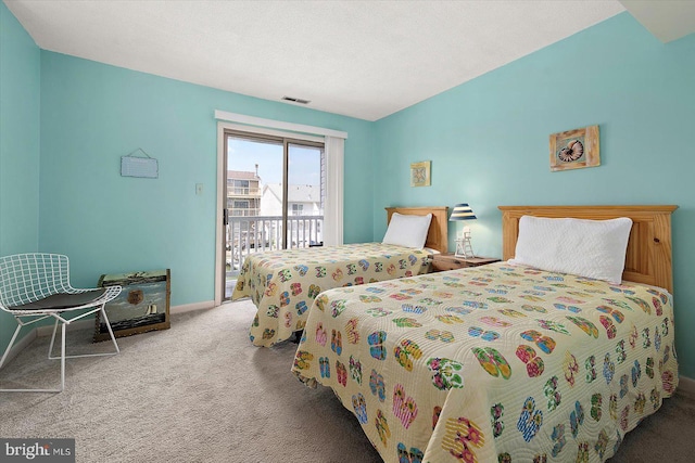 614 Osprey Rd Unit D, Ocean City, MD 21842 - carpeted bedroom with access to outside and baseboards