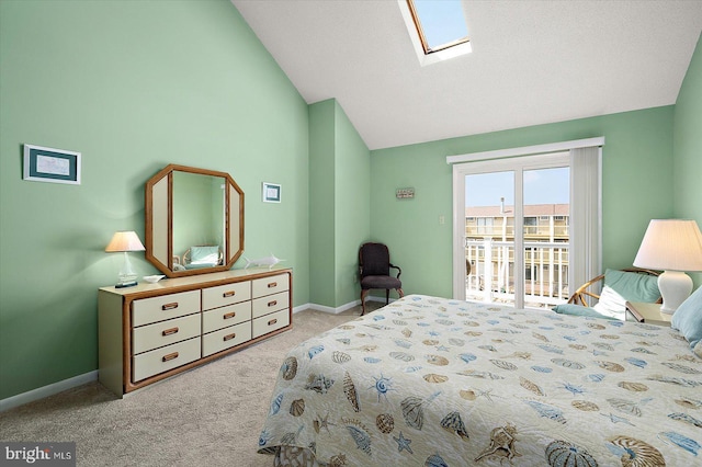 614 Osprey Rd Unit D, Ocean City, MD 21842 - bedroom featuring vaulted ceiling, carpet, a skylight, access to exterior, and baseboards