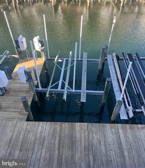 614 Osprey Rd Unit D, Ocean City, MD 21842 - dock area with a water view and boat lift