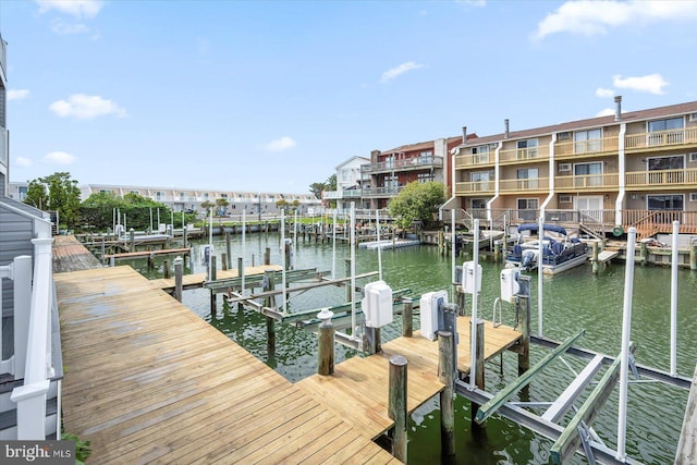 614 Osprey Rd Unit D, Ocean City, MD 21842 - dock featuring boat lift and a water view