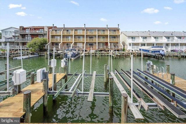 614 Osprey Rd Unit D, Ocean City, MD 21842 - dock with a water view and a residential view