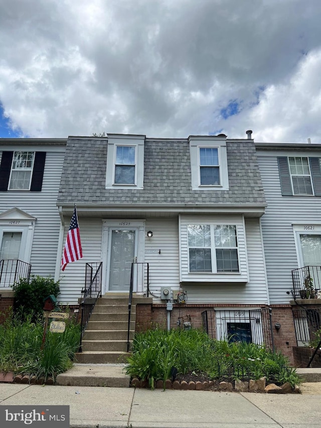 10625 Shasta Ct Unit T, Damascus, MD 20872 - view of front facade with mansard roof, roof with shingles, and brick siding