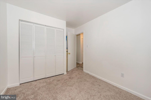 10625 Shasta Ct Unit T, Damascus, MD 20872 - unfurnished bedroom featuring carpet floors, baseboards, and a closet
