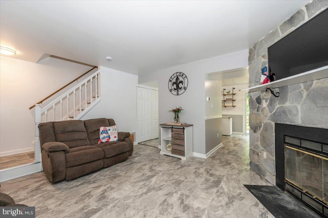 10625 Shasta Ct Unit T, Damascus, MD 20872 - living room with stairs, a stone fireplace, and baseboards