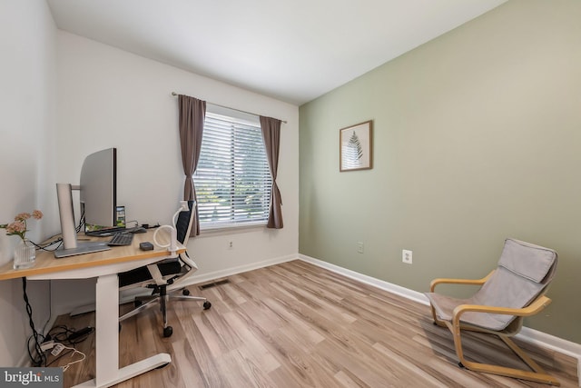 10707 Muirfield Dr, Potomac, MD 20854 - office area with light wood-type flooring and baseboards