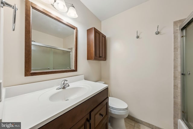 10707 Muirfield Dr, Potomac, MD 20854 - full bathroom featuring vanity, toilet, and tile patterned flooring