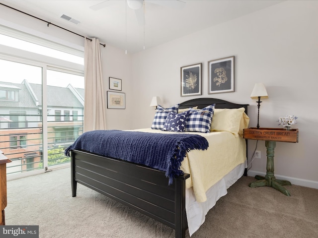 bedroom with carpet flooring, a ceiling fan, and baseboards