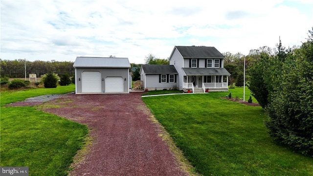 18 Cub Ln, Jim Thorpe, PA 18229 - view of front of home featuring an outdoor structure, covered porch, a garage, and a front lawn
