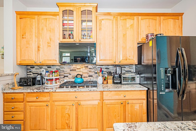 9 Webster Hill Ct, Clarksburg, MD 20871 - kitchen with black appliances, backsplash, glass insert cabinets, and light stone countertops