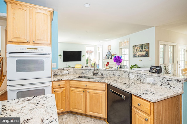 9 Webster Hill Ct, Clarksburg, MD 20871 - kitchen featuring dishwasher, double oven, light brown cabinets, light stone countertops, and open floor plan