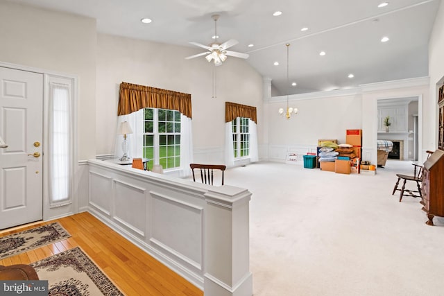 103 Dylan Cir, Avondale, PA 19311 - entryway featuring high vaulted ceiling, a ceiling fan, a wainscoted wall, a fireplace, and recessed lighting