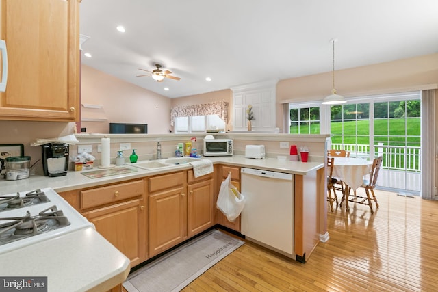 103 Dylan Cir, Avondale, PA 19311 - kitchen featuring white appliances, a sink, light wood-type flooring, light countertops, and recessed lighting
