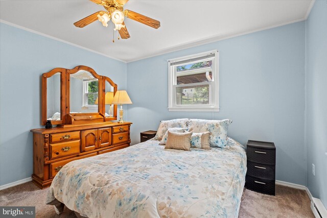 bedroom featuring light colored carpet, multiple windows, baseboards, and crown molding