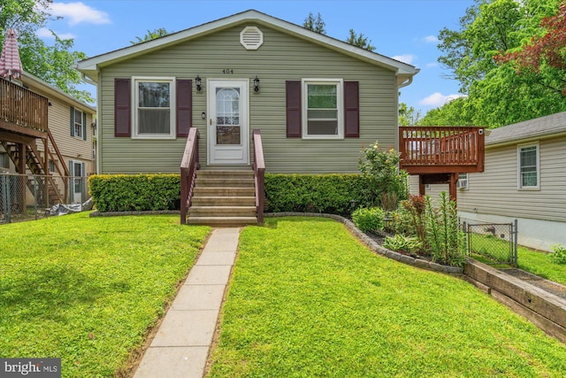 view of front of property featuring entry steps and a wooden deck