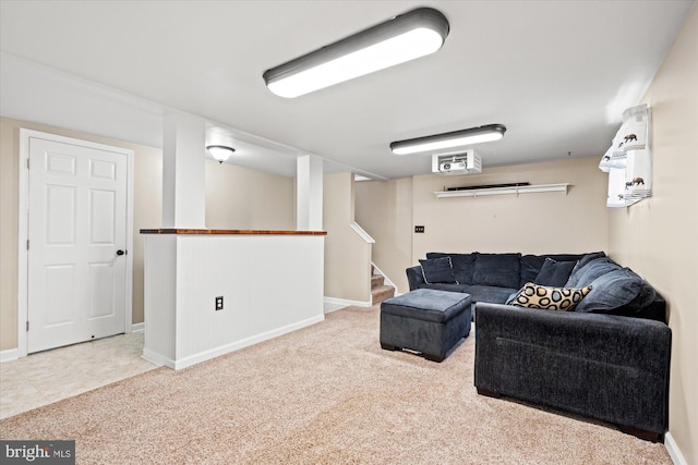 carpeted living room with stairway and baseboards