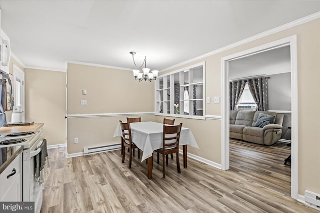 dining room with baseboard heating, a chandelier, crown molding, light wood-style floors, and a baseboard radiator