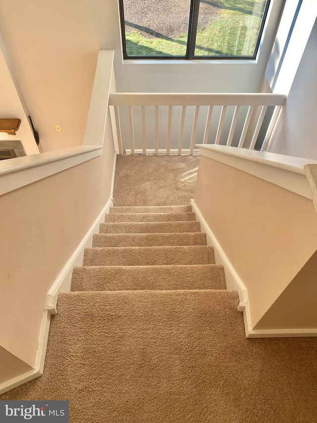 411 Lynetree Dr Unit 12-C, West Chester, PA 19380 - staircase featuring carpet
