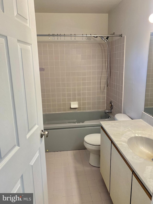 411 Lynetree Dr Unit 12-C, West Chester, PA 19380 - bathroom featuring toilet, vanity, tub / shower combination, and tile patterned flooring