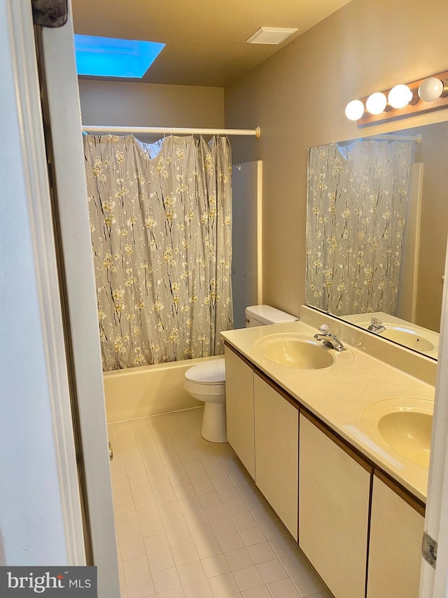411 Lynetree Dr Unit 12-C, West Chester, PA 19380 - full bath featuring tile patterned flooring, double vanity, toilet, and shower / bath combination with curtain