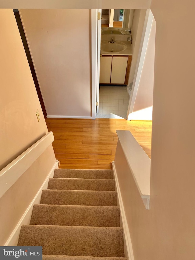 411 Lynetree Dr Unit 12-C, West Chester, PA 19380 - stairs featuring wood finished floors