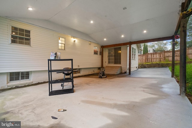 view of patio featuring fence