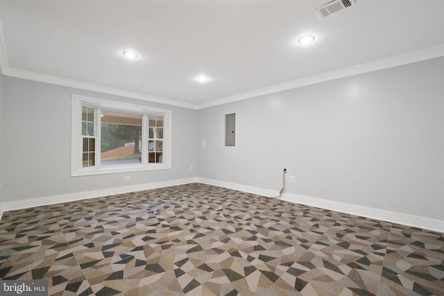 unfurnished room featuring ornamental molding, electric panel, baseboards, and recessed lighting
