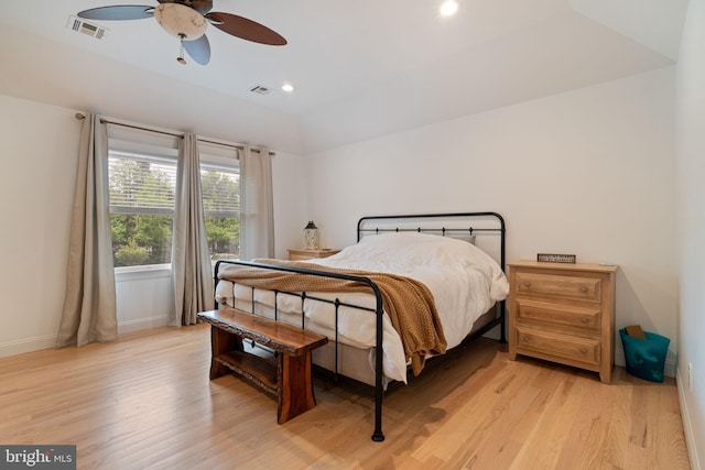 bedroom with baseboards, light wood-type flooring, recessed lighting, and a ceiling fan