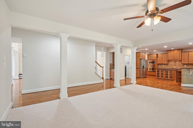 711 Bleak Hill Pl, Upper Marlboro, MD 20774 - unfurnished living room featuring ornate columns, recessed lighting, light wood finished floors, baseboards, and ceiling fan