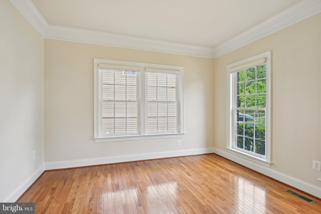 711 Bleak Hill Pl, Upper Marlboro, MD 20774 - spare room featuring ornamental molding, light wood-style flooring, and baseboards