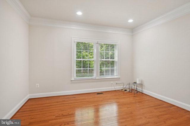 711 Bleak Hill Pl, Upper Marlboro, MD 20774 - empty room with crown molding, wood finished floors, baseboards, and recessed lighting