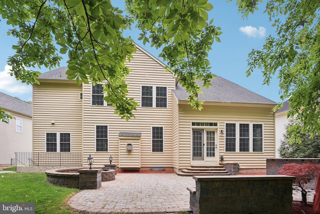 711 Bleak Hill Pl, Upper Marlboro, MD 20774 - back of house featuring a patio area, entry steps, and roof with shingles
